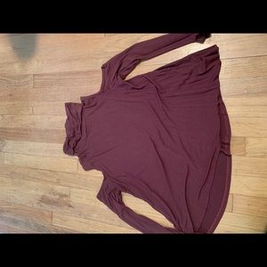 Open shoulder turtleneck shirt